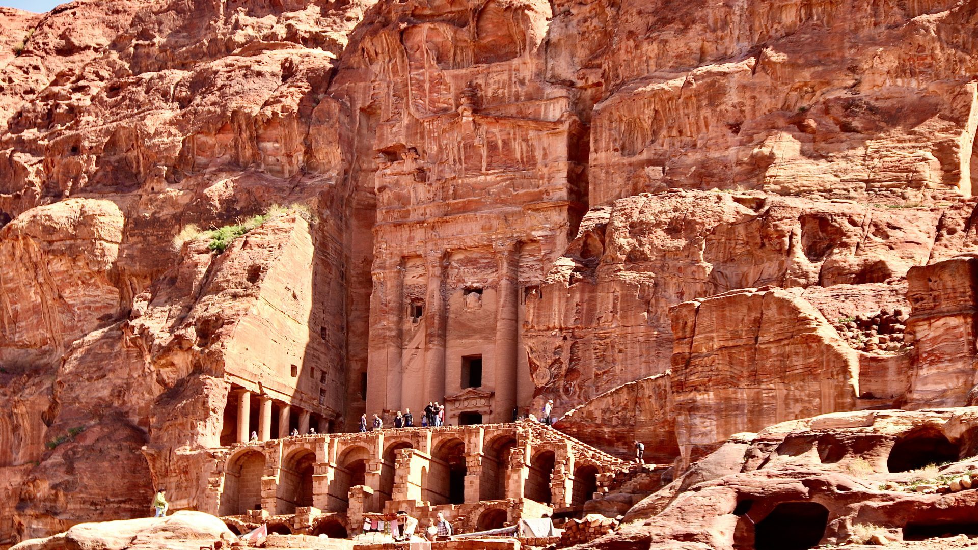 Royal Tombs in Petra, Jordan, featuring monumental Nabataean rock-cut facades carved into the dramatic rose-red sandstone cliffs