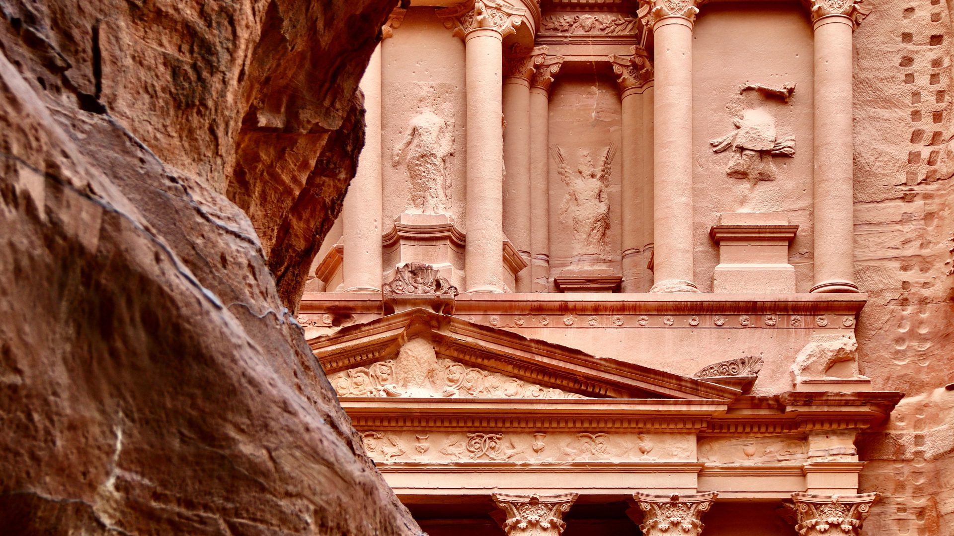 Detailed rock-carved facade of Al-Khazneh Treasury in Petra Jordan
