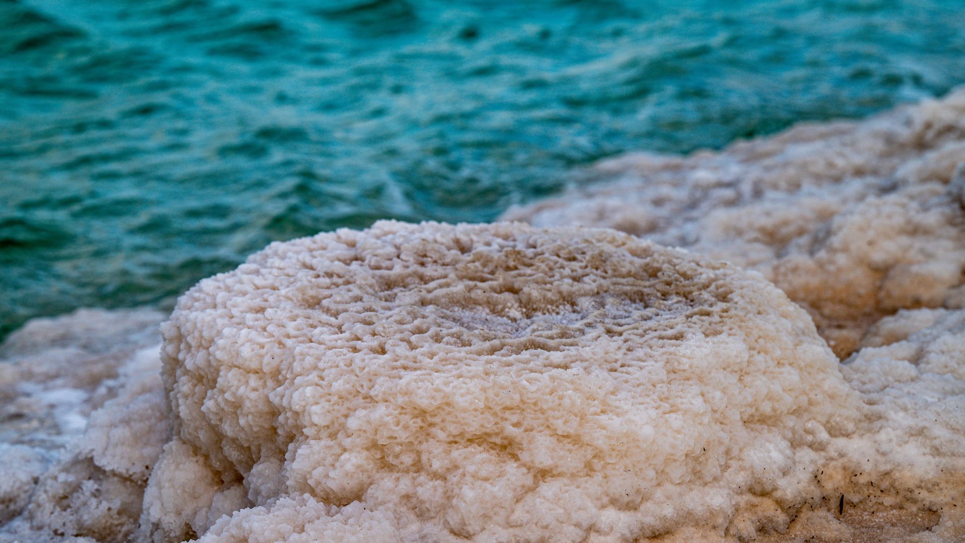 Natural salt formations along the Dead Sea shoreline in Jordan